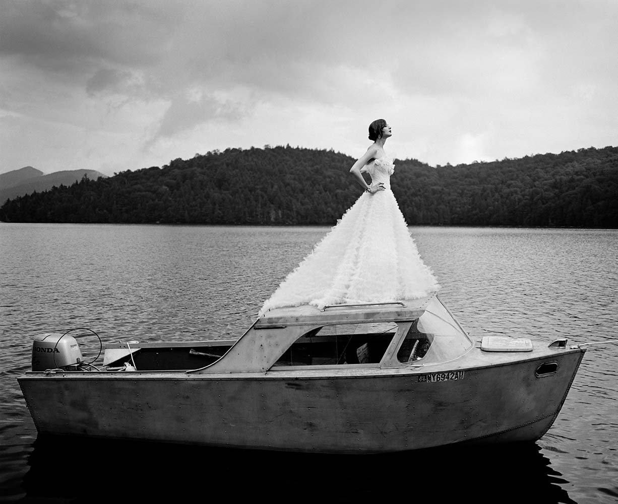 Laura on top of Boat,  Lake Placid, New York, 2006© Rodney Smith